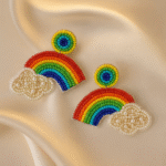 Detailed view of handcrafted rainbow beaded earring with pearl cloud embellishment Title: