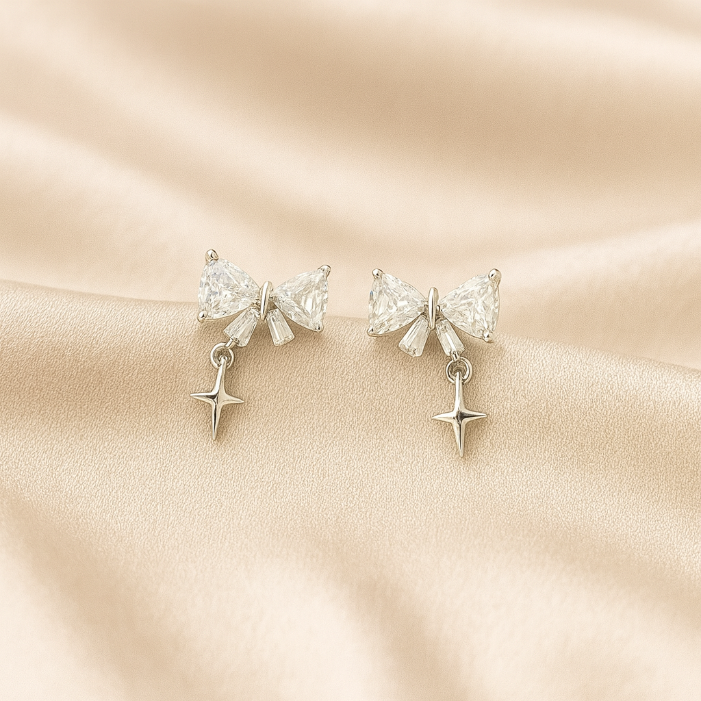 Twilight Bloom 92.5 Silver Earrings | Star Drop Bow Studs | Hypoallergenic & Anti-Tarnish Twilight Bloom 92.5 silver earrings with bow-shaped CZ tops and star drop charms, hypoallergenic and anti-tarnish — Masaira