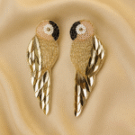 Elegant handcrafted gold parrot earrings with pearl and sequin detailing — Masaira designer statement jewellery