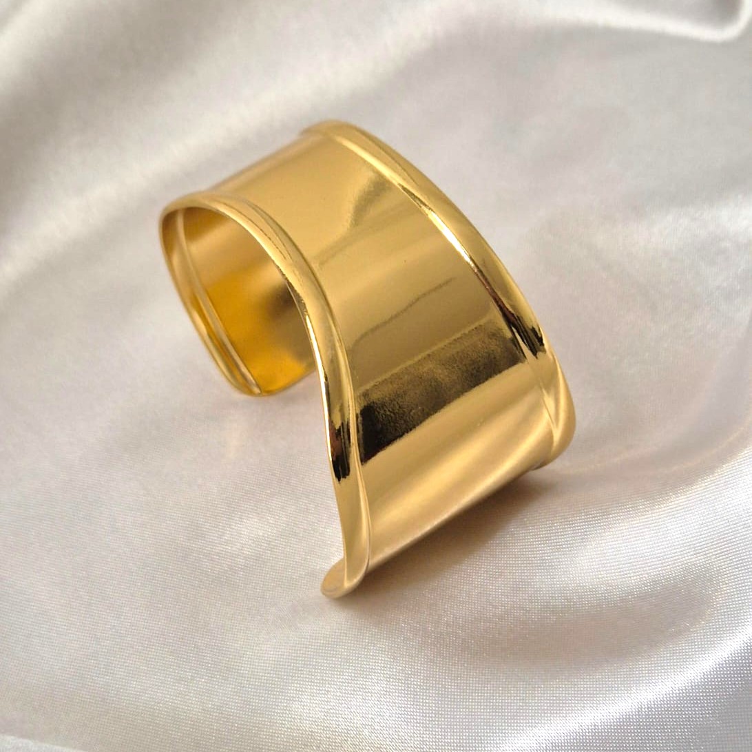 Aurora Curve Cuff Bracelet in 18 Carat Gold Finish on Satin Fabric
