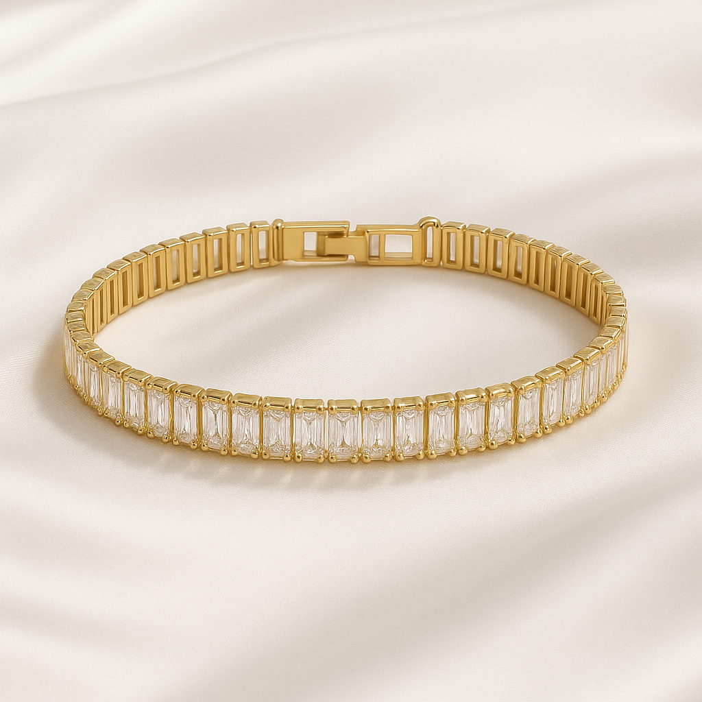 Gold-plated baguette stone bracelet on satin background