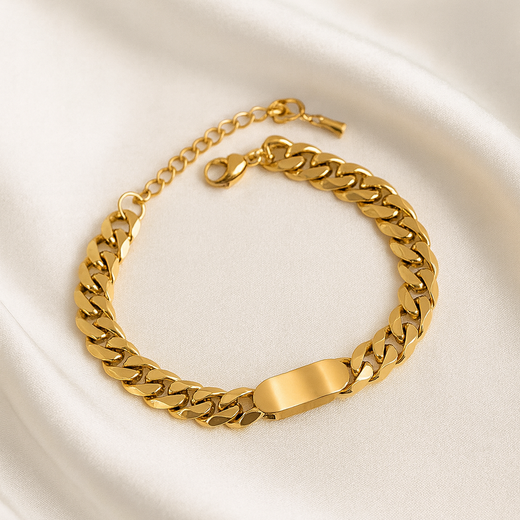 Vanguard 18 Carat Gold Plated Chain Bracelet – Anti-Tarnish & Hypoallergenic 18 carat gold plated unisex curb link bracelet with ID plate on satin background