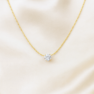 Delicate 18 carat gold plated solitaire necklace with round cubic zirconia pendant, anti-tarnish and hypoallergenic