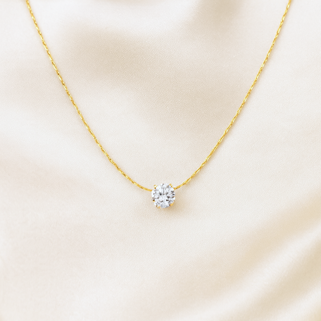 Solitaire Glow Necklace | 18 Carat Gold Plated | Anti-Tarnish & Hypoallergenic Delicate 18 carat gold plated solitaire necklace with round cubic zirconia pendant, anti-tarnish and hypoallergenic