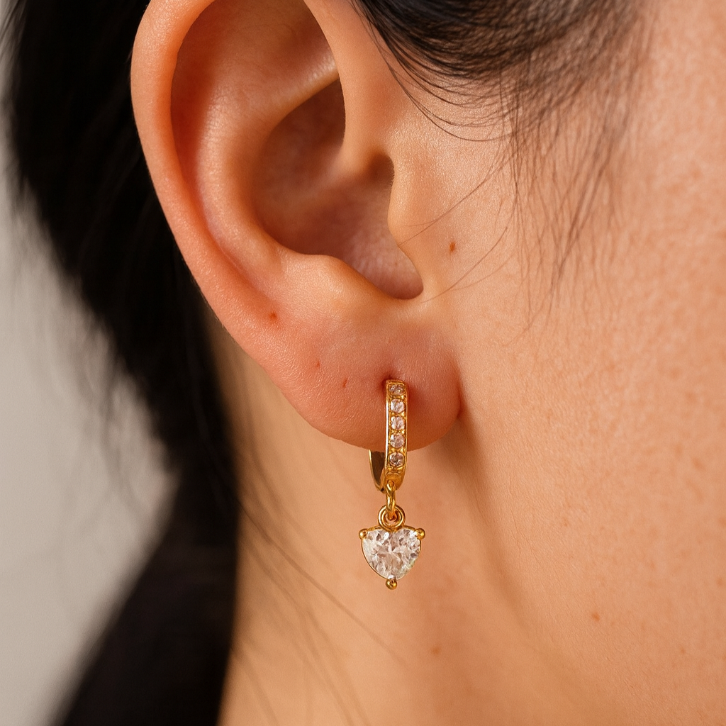 18 carat gold plated hoop earrings with heart-shaped cubic zirconia drop