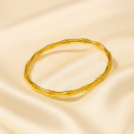 Bamboo Gleam Bangle in 18 carat gold plating with smooth segmented design