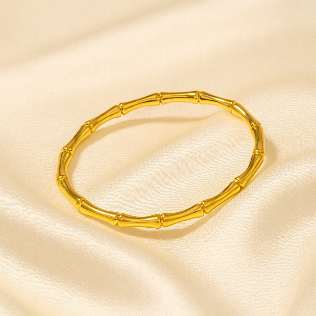 Bamboo Gleam Bangle in 18 carat gold plating with smooth segmented design
