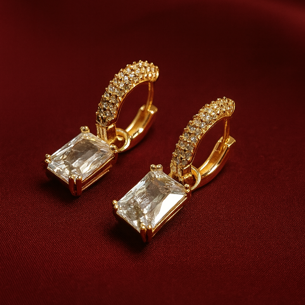 Emerald Crystal Drop Hoop Earrings – Gold-Plated Luxury Luxury gold-plated hoop earrings with emerald-cut crystal drops and pavé stones – statement jewelry for evening wear.