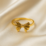 Golden Grace Bow Ring in 18 carat gold with a delicate bow design