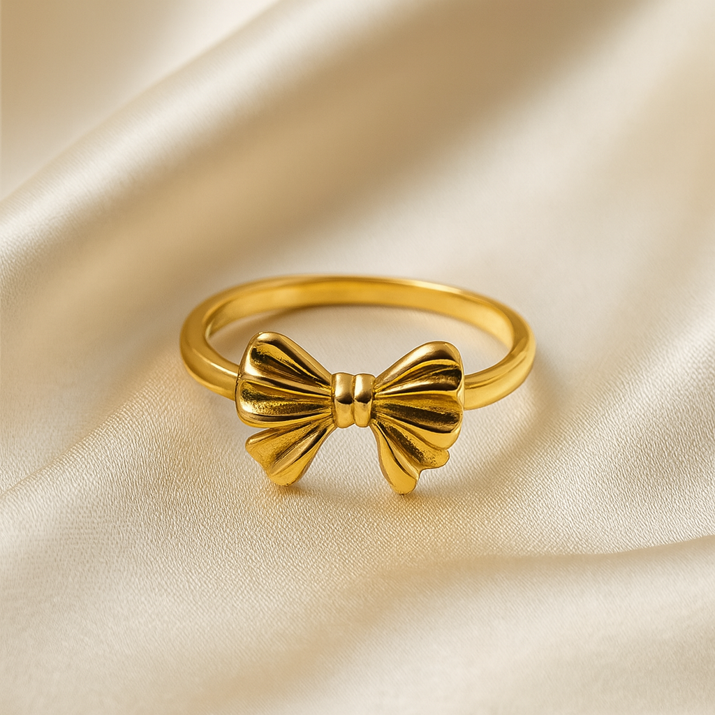 Golden Grace Bow Ring in 18 carat gold with a delicate bow design