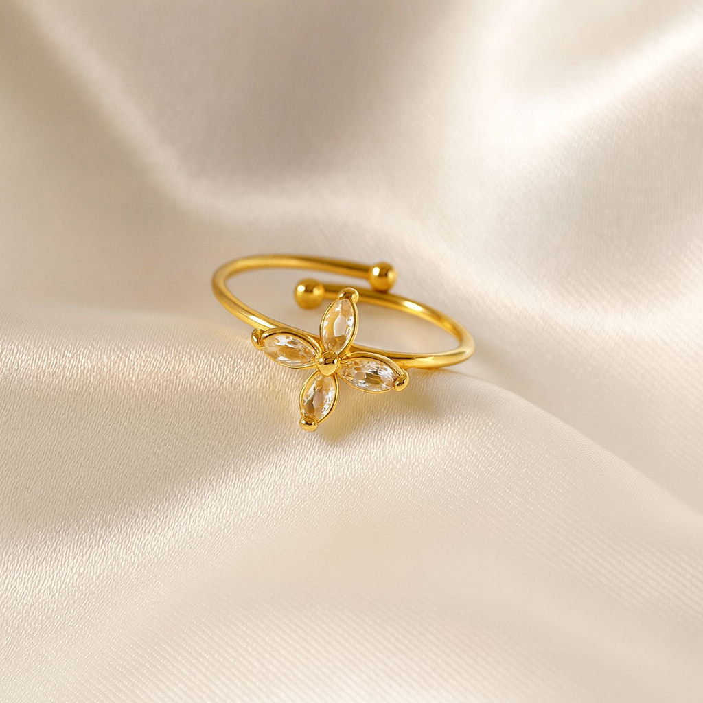 Ethereal Blossom Ring in 18 carat gold with floral cubic zirconia design