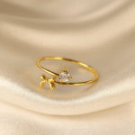 Luna Bow Ring in 18 carat gold with bow and zircon centerpiece
