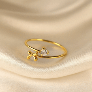 Luna Bow Ring in 18 carat gold with bow and zircon centerpiece
