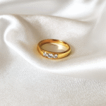 Trinity Glow Ring in 18 carat gold with three cubic zircon stones