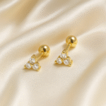 Trinity Gleam Studs in 18 carat gold with cubic zirconia stones and ball stopper