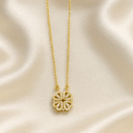 Magnetic Clover Necklace in 18 carat gold with dual-look cubic zirconia clover pendant