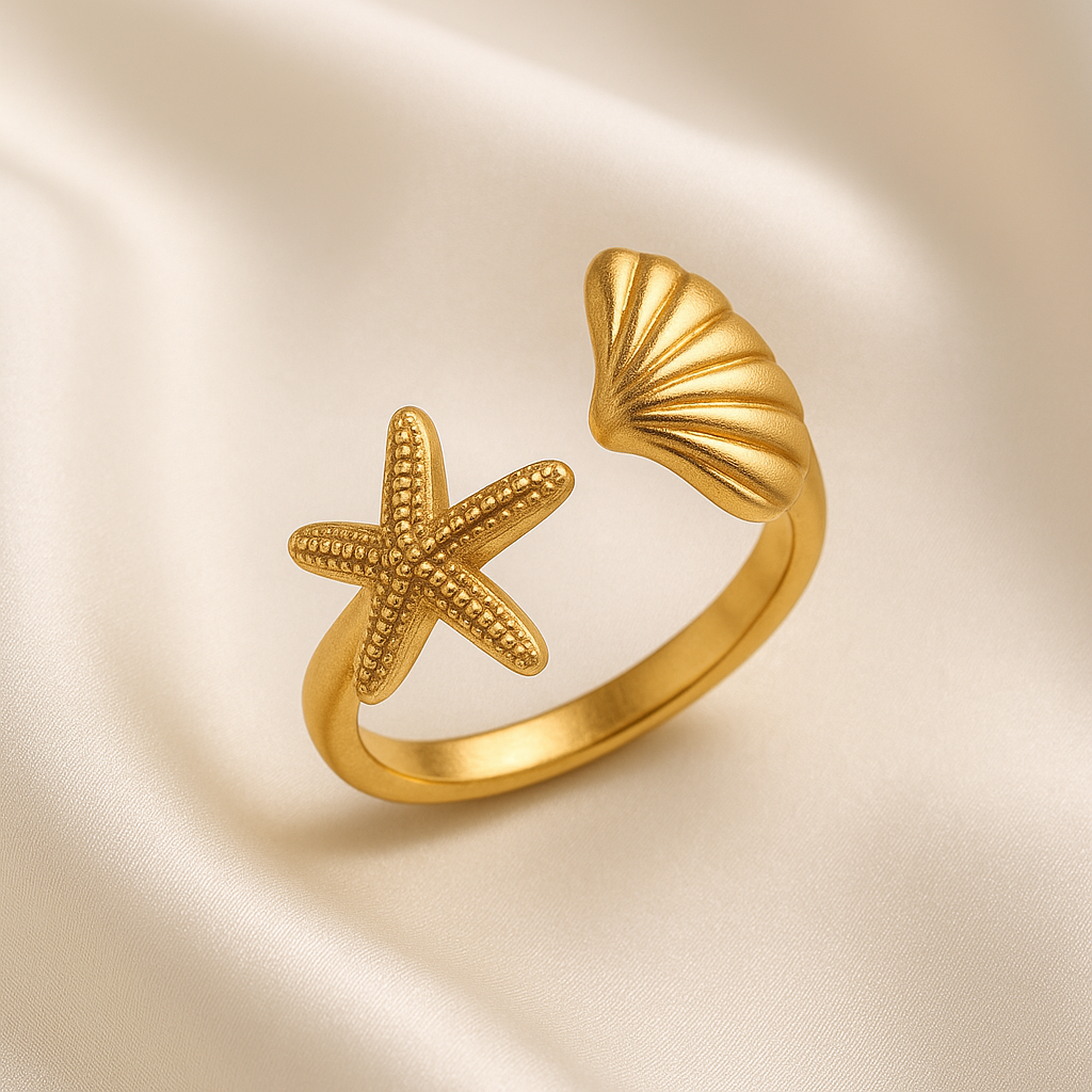 Ocean Muse Ring | 18 Carat Gold Plated Starfish & Shell Adjustable Ring Ocean Muse Ring in 18 carat gold featuring a starfish and shell open-band design.