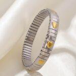 Aurielle Heartlink unisex bracelet in stainless steel with 18 carat gold heart accents, anti-tarnish and hypoallergenic finish