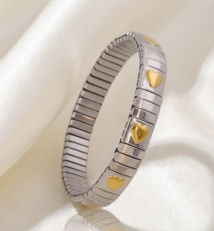 Aurielle Heartlink unisex bracelet in stainless steel with 18 carat gold heart accents, anti-tarnish and hypoallergenic finish