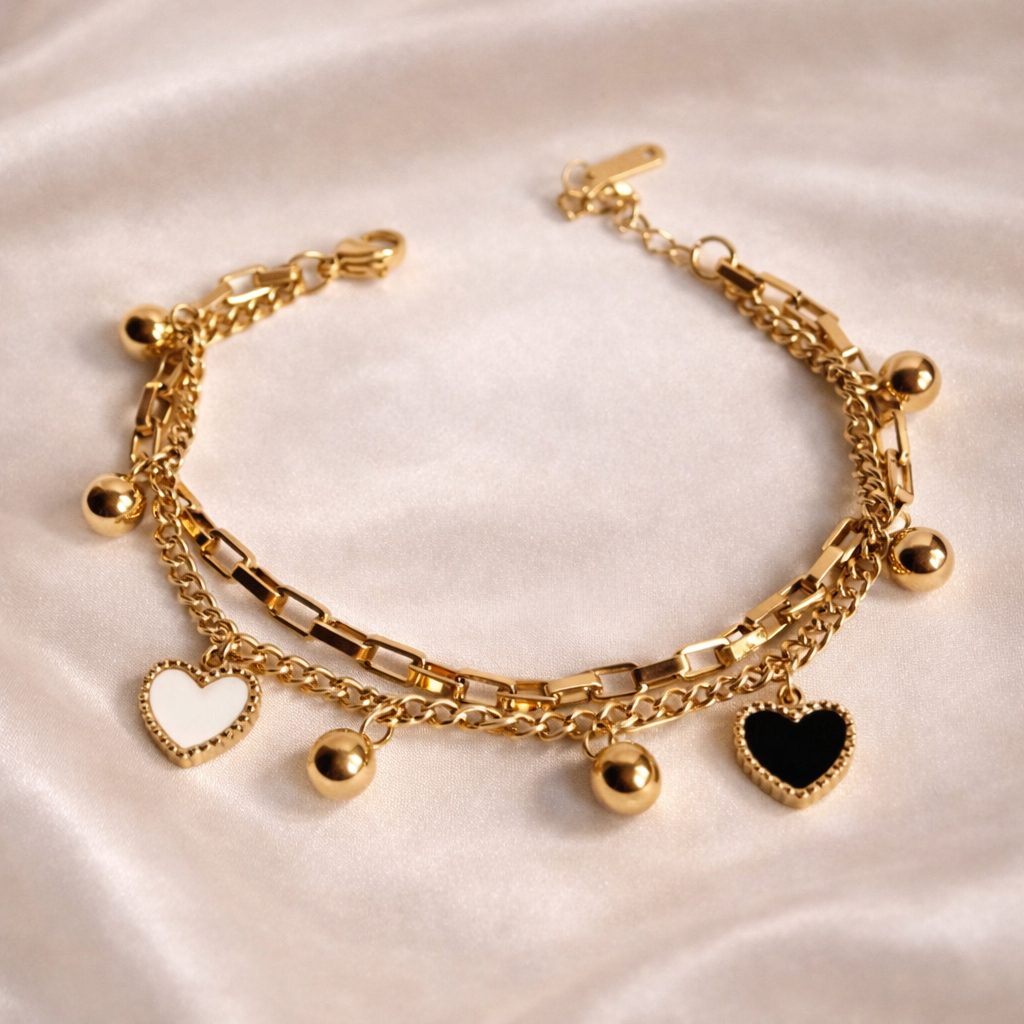 Layered heart charm bracelet in stainless steel with 18 carat gold plating, anti-tarnish and hypoallergenic