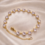 Heart stone tennis bracelet in stainless steel with 18 carat gold plating, anti-tarnish and hypoallergenic