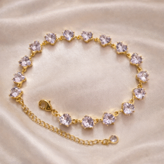 Heart stone tennis bracelet in stainless steel with 18 carat gold plating, anti-tarnish and hypoallergenic