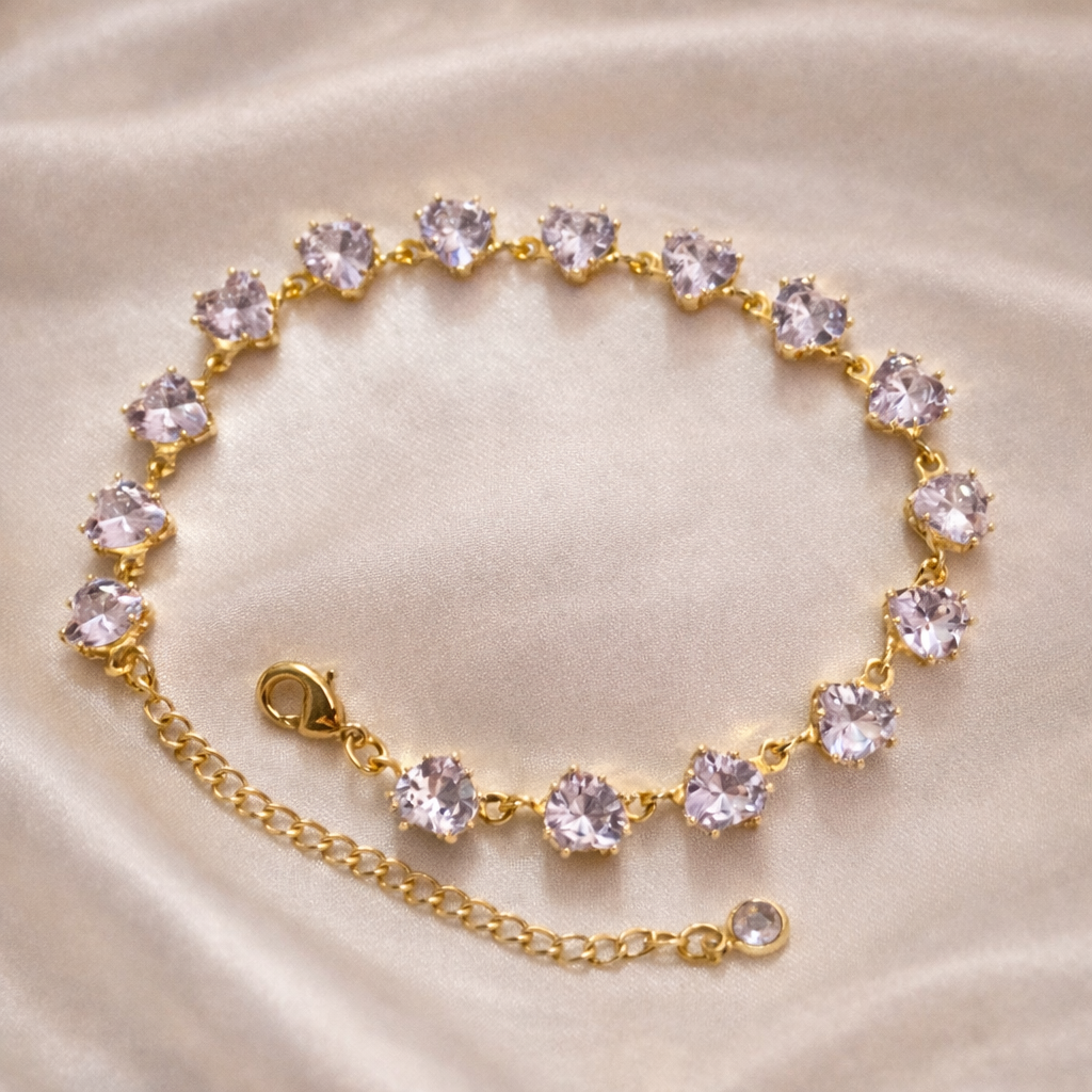 Heart stone tennis bracelet in stainless steel with 18 carat gold plating, anti-tarnish and hypoallergenic