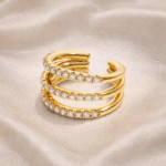 Gold multi-row ear cuff with clear zircon stones in stainless steel with 18 carat gold plating, anti-tarnish and hypoallergenic