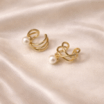 Gold spiral pearl ear cuffs in stainless steel with 18 carat gold plating, anti-tarnish and hypoallergenic