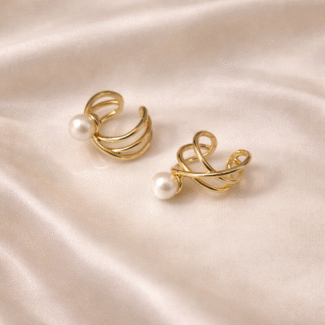 Gold spiral pearl ear cuffs in stainless steel with 18 carat gold plating, anti-tarnish and hypoallergenic